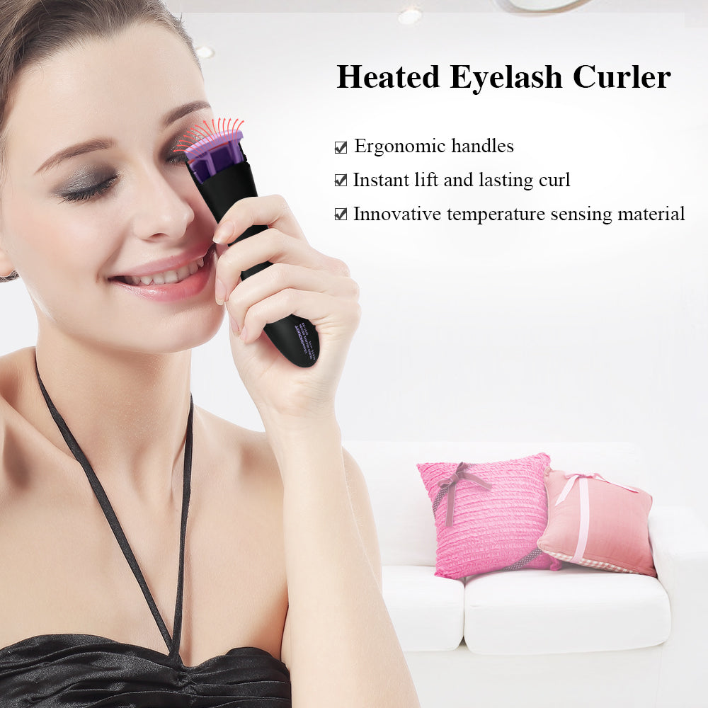 Heated eyelash curler with double heating silicone pads